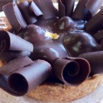 Chocolate-covered Raspberry Tart with Gold Leaf Chocolate-covered Raspberry Tart with Gold Leaf