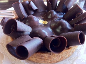 Chocolate-covered Raspberry Tart with Gold Leaf